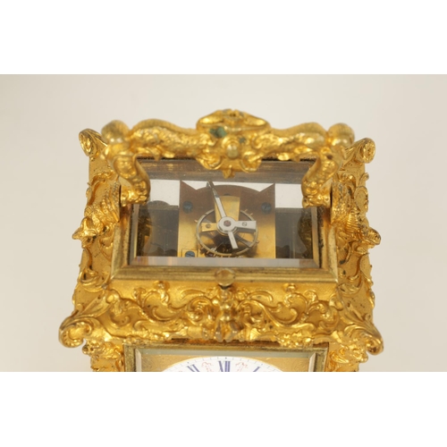 712 - A FINE MID 19TH CENTURY GILT BRASS FRENCH ROCOCO REPEATING CARRIAGE CLOCK WITH ALARM OF SMALL SIZE -... 