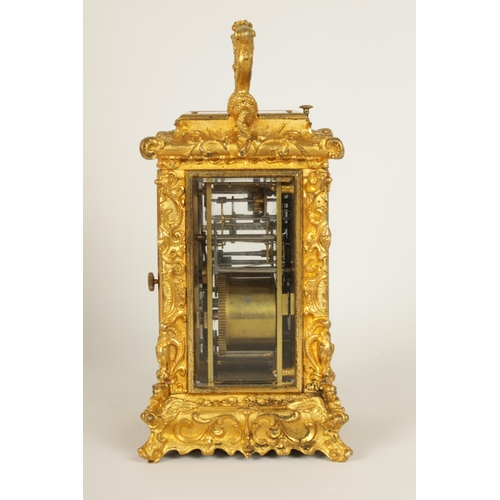 712 - A FINE MID 19TH CENTURY GILT BRASS FRENCH ROCOCO REPEATING CARRIAGE CLOCK WITH ALARM OF SMALL SIZE -... 