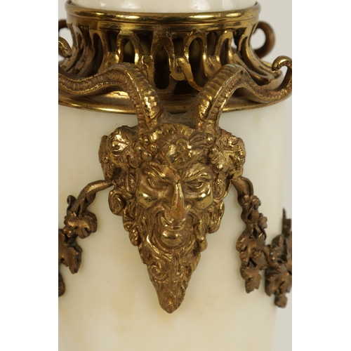 562 - A PAIR OF 19TH CENTURY CARRARA MARBLE AND ORMOLU MOUNTED CASOLETTES with detachable finials, peirced... 