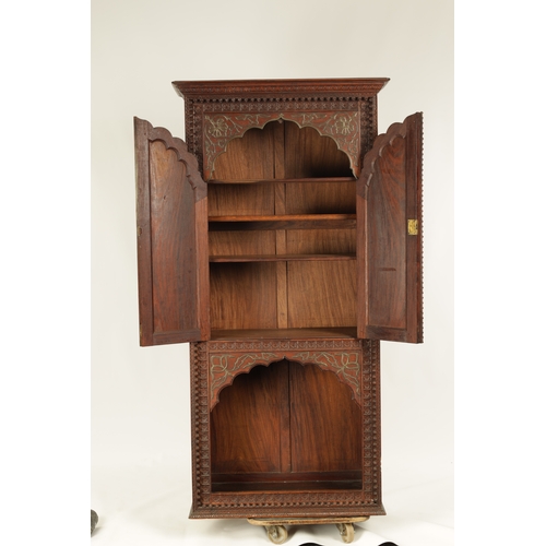 175 - AN EARLY 19TH CENTURY ANGLO-INDIAN HARDWOOD SIDE CABINET with panelled sides and detailed carved dec... 