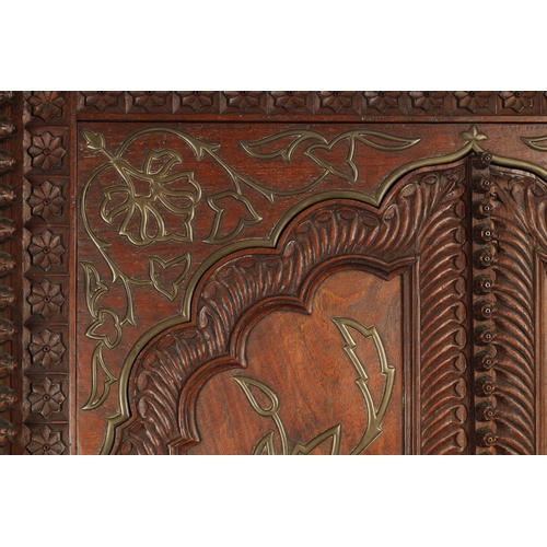 175 - AN EARLY 19TH CENTURY ANGLO-INDIAN HARDWOOD SIDE CABINET with panelled sides and detailed carved dec... 