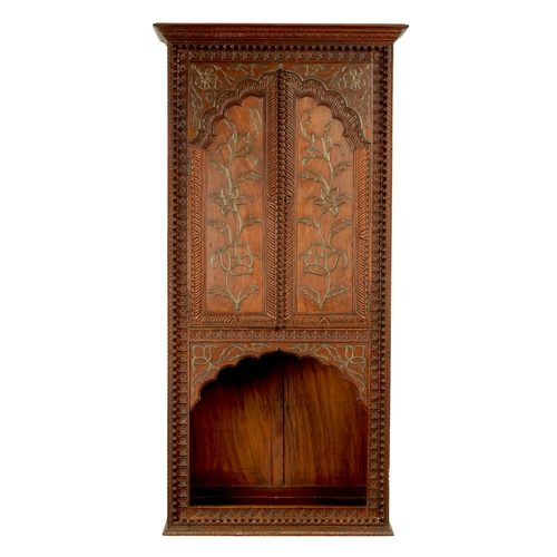 175 - AN EARLY 19TH CENTURY ANGLO-INDIAN HARDWOOD SIDE CABINET with panelled sides and detailed carved dec... 