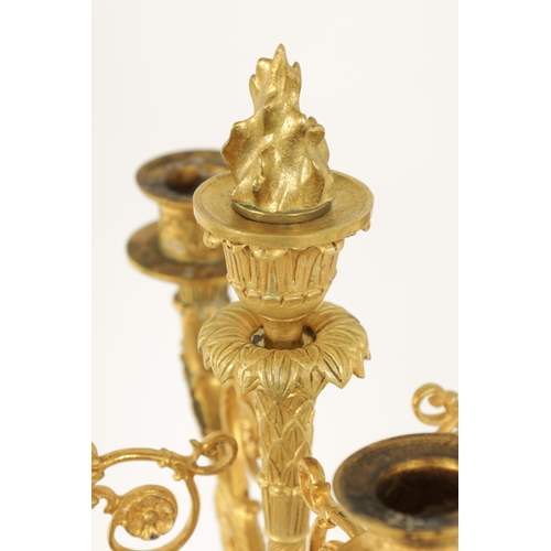 588 - A FINE PAIR OF LATE 19TH CENTURY BRONZE AND ORMOLU FRENCH EMPIRE STYLE FOUR BRANCH CANDELABRA the gi... 