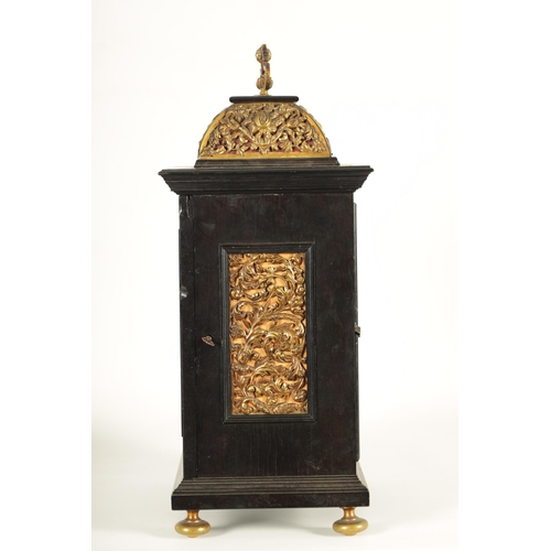 1009 - A 17TH CENTURY STYLE CONTINENTAL EBONY VENEERED AND GILT BRASS MOUNTED BASKET TOP BRACKET CLOCK the ... 