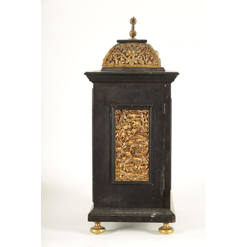 1009 - A 17TH CENTURY STYLE CONTINENTAL EBONY VENEERED AND GILT BRASS MOUNTED BASKET TOP BRACKET CLOCK the ... 