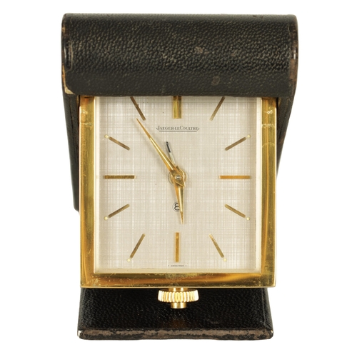 1012 - A MID 20TH CENTURY JAEGER LE COULTRE TRAVELLING ALARM CLOCK with leather case and number 106140, the... 