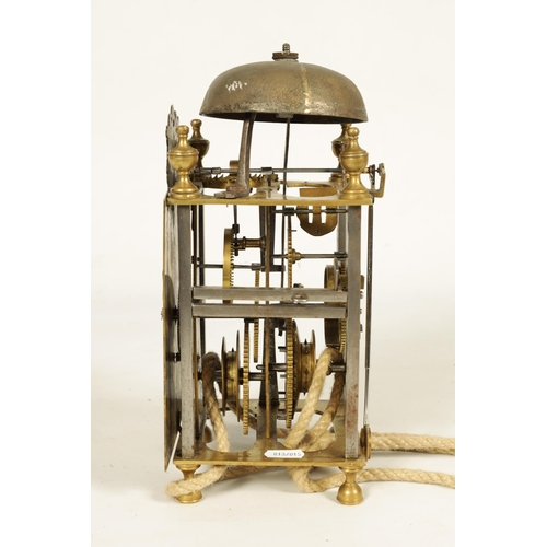 1017 - A LATE 17TH CENTURY ITALIAN CHAMBER CLOCK the rectangular brass leaf engraved dial with Roman numera... 