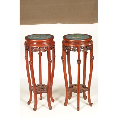 103 - A PAIR OF LATE 19TH/EARLY 20TH CENTURY HARDWOOD CHINESE JARDINIERE STANDS WITH CLOISONN ENAMEL TOPS... 