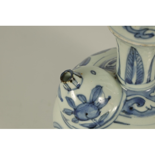 104 - A EARLY MING DYNASTY BLUE AND WHITE KENDI with bird and leafing flower spray decoration. (18cm high ... 