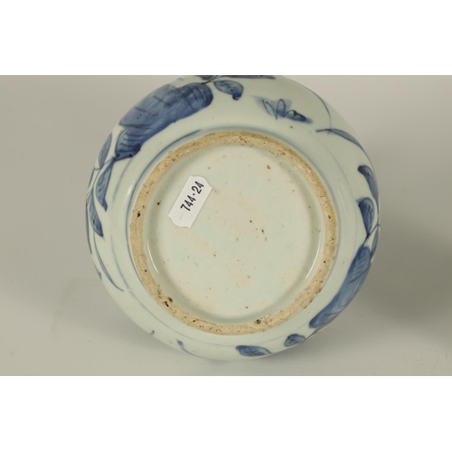 104 - A EARLY MING DYNASTY BLUE AND WHITE KENDI with bird and leafing flower spray decoration. (18cm high ... 