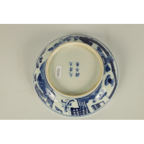 105 - A LATE 19TH CENTURY CHING DYNASTY CHINESE BLUE AND WHITE BOWL decorated with an outer fenced garden ... 