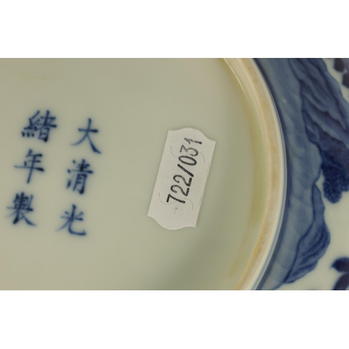 105 - A LATE 19TH CENTURY CHING DYNASTY CHINESE BLUE AND WHITE BOWL decorated with an outer fenced garden ... 