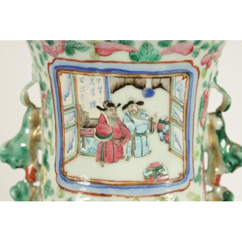 107 - TWO LATE 19TH CENTURY CHINESE FAMILLE ROSE PORCELAIN VASES of baluster form with scenic panels among... 