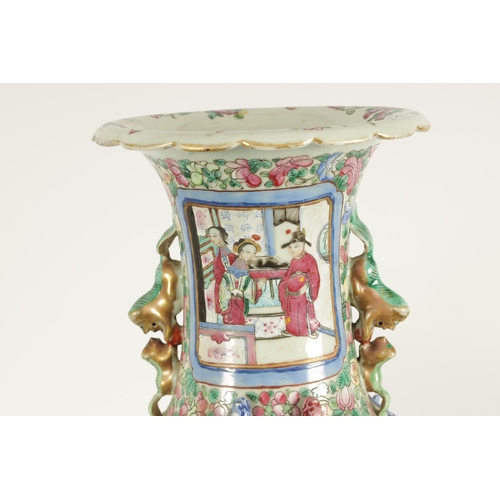 107 - TWO LATE 19TH CENTURY CHINESE FAMILLE ROSE PORCELAIN VASES of baluster form with scenic panels among... 