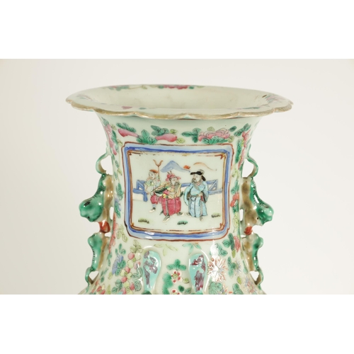 107 - TWO LATE 19TH CENTURY CHINESE FAMILLE ROSE PORCELAIN VASES of baluster form with scenic panels among... 