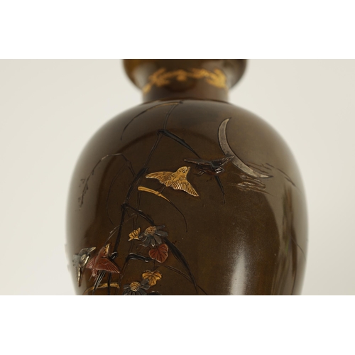 109 - A FINE JAPANESE MEIJI PERIOD BRONZE AND MIXED METAL SHOULDERED VASE with slender flared neck above t... 