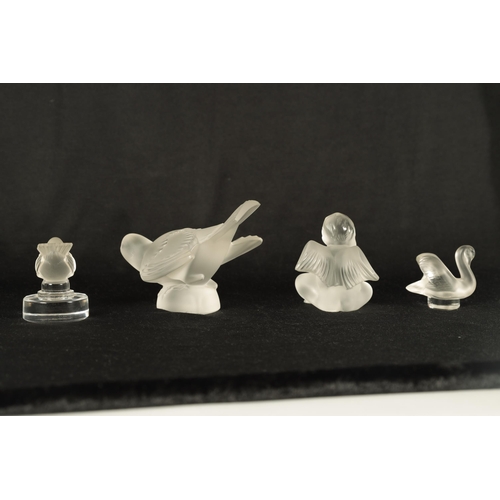 11 - A COLLECTION OF FOUR LALIQUE FRANCE FROSTED GLASS SCULPTURES comprising of a Swallow, Swan Wren and ... 