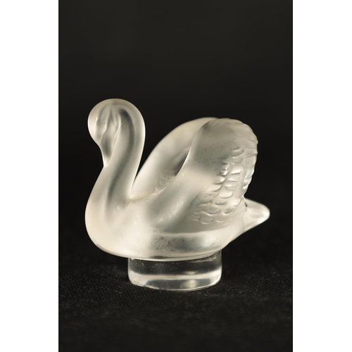 11 - A COLLECTION OF FOUR LALIQUE FRANCE FROSTED GLASS SCULPTURES comprising of a Swallow, Swan Wren and ... 