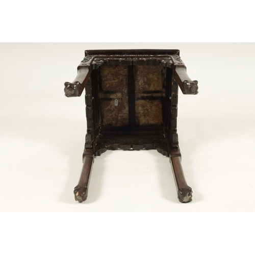 111 - A 19TH CENTURY CHINESE HARDWOOD JARDINIERE TABLE with inset pink marble top above a floral and leafw... 