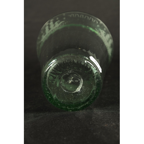 12 - AN 18TH CENTURY ETCHED GREEN GLASS NAVAL VASE the tapering fluted body decorated with etched ships (... 