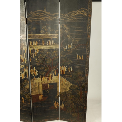 123 - A 19TH CENTURY CHINESE BLACK LACQUERWORK FOUR FOLD SCREEN with scrolled gilt and flower head border ... 