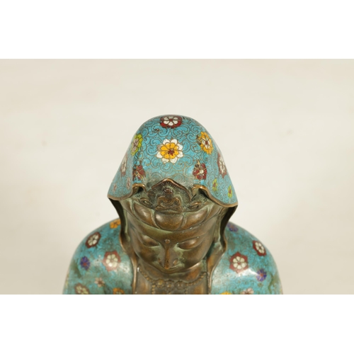 125 - A LARGE QIANLONG PERIOD CHINESE CLOISONNE ENAMEL BRONZE SEATED GUANYIN BUDDHA with an all-around flo... 
