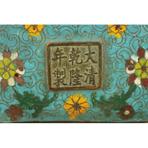 125 - A LARGE QIANLONG PERIOD CHINESE CLOISONNE ENAMEL BRONZE SEATED GUANYIN BUDDHA with an all-around flo... 