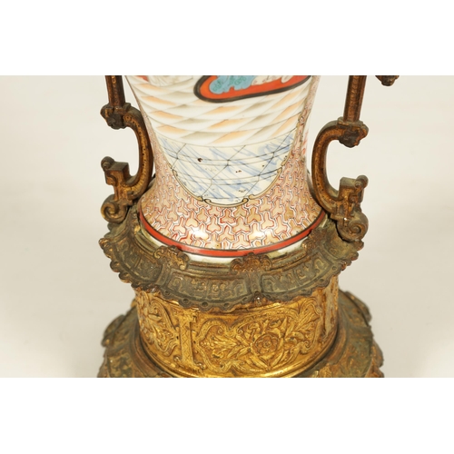 133 - A 19TH CENTURY CHINESE FAMILLE ROSE VASE LAMP with ormolu mounted oil lamp and figural scene to the ... 