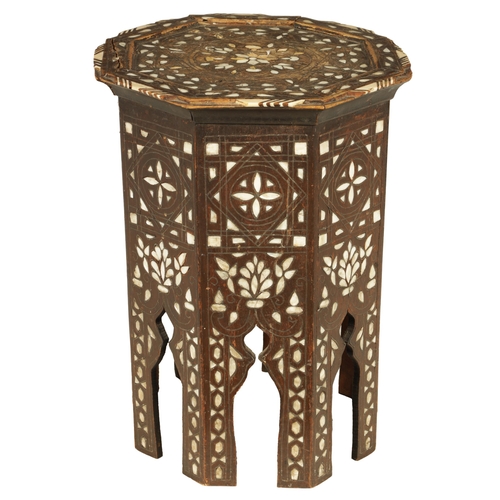 137 - A 19TH CENTURY BONE AND MOTHER OF PEARL INLAID OCCASIONAL TABLE of octagonal shape with arched cut o... 