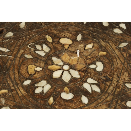 137 - A 19TH CENTURY BONE AND MOTHER OF PEARL INLAID OCCASIONAL TABLE of octagonal shape with arched cut o... 