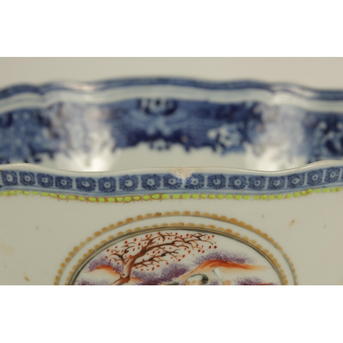 140 - A 19TH CENTURY CHINESE BLUE ANDS WHITER PORCELAIN BOWL with wavey edge floral pattern and coloured m... 