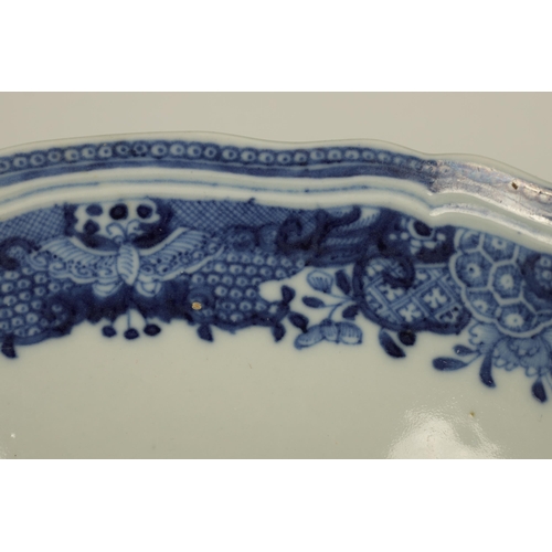 140 - A 19TH CENTURY CHINESE BLUE ANDS WHITER PORCELAIN BOWL with wavey edge floral pattern and coloured m... 