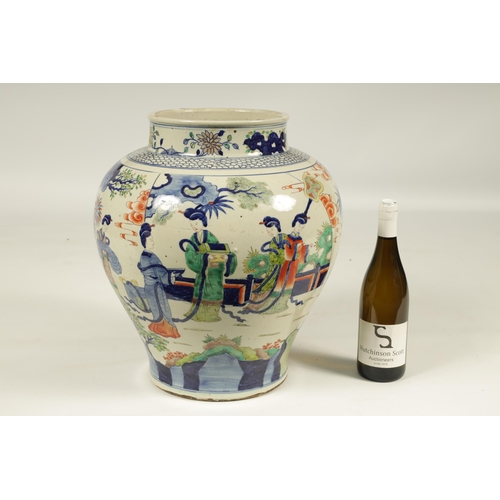 141 - A 19TH CENTURY CHINESE FAMILLE NOIRE WUCAI BULBOUS VASE decorated with female figures in a garden se... 