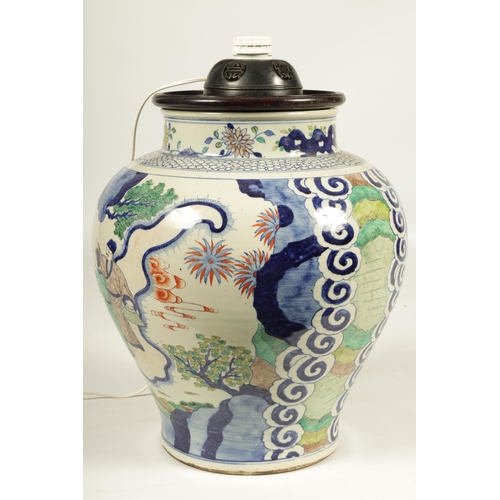 141 - A 19TH CENTURY CHINESE FAMILLE NOIRE WUCAI BULBOUS VASE decorated with female figures in a garden se... 