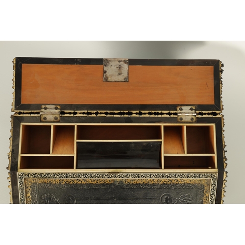 142 - A GOOD 19TH CENTURY ANGLO INDIAN VIZAGAPATAM STAG HORN AND IVORY INLAID WRITING SLOPE the hinged top... 