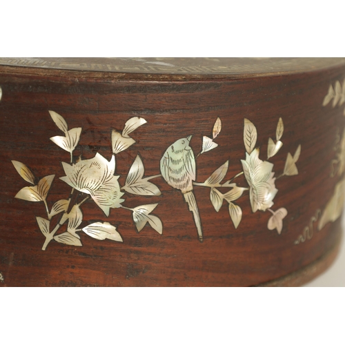 144 - A 19TH CENTURY CHINESE HARDWOOD AND MOTHER OF PEARL INLAID CIRCULAR BOX OF LARGE SIZE the lift-off t... 