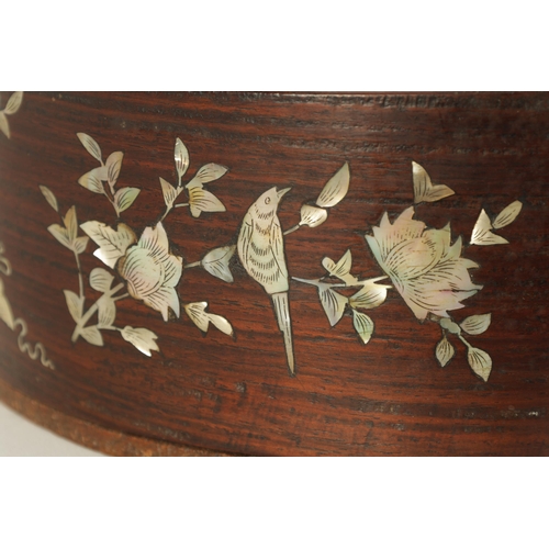 144 - A 19TH CENTURY CHINESE HARDWOOD AND MOTHER OF PEARL INLAID CIRCULAR BOX OF LARGE SIZE the lift-off t... 