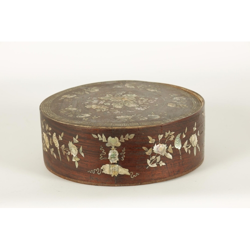 144 - A 19TH CENTURY CHINESE HARDWOOD AND MOTHER OF PEARL INLAID CIRCULAR BOX OF LARGE SIZE the lift-off t... 