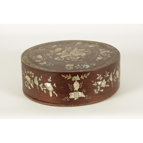 144 - A 19TH CENTURY CHINESE HARDWOOD AND MOTHER OF PEARL INLAID CIRCULAR BOX OF LARGE SIZE the lift-off t... 