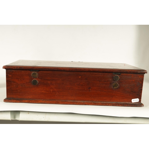 145 - A 17TH/18TH CENTURY CHINESE HARDWOOD LIDDED BOX with brass fittings and side handles; the fitted int... 