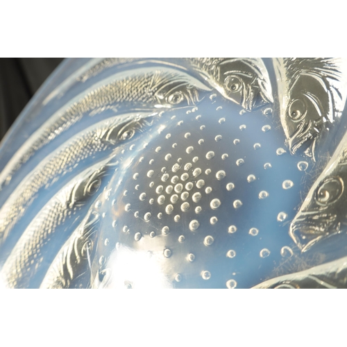 15 - A FRENCH RENE LALIQUE 'POISSONS' OPALESCENT GLASS COUPE PLATE of dished form with swirling sardines ... 