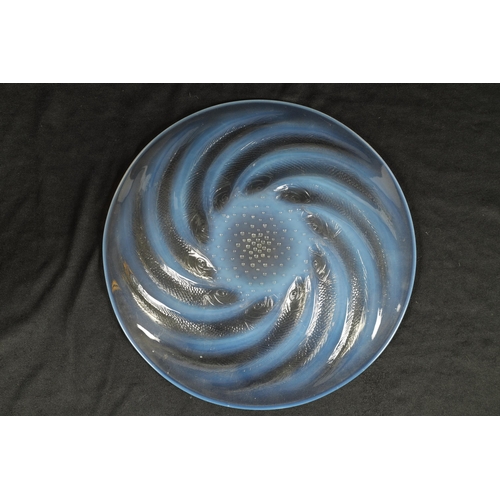 15 - A FRENCH RENE LALIQUE 'POISSONS' OPALESCENT GLASS COUPE PLATE of dished form with swirling sardines ... 