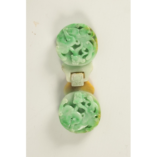 151 - A 19TH CENTURY CHINESE GREEN JADE CARVED BELT BUCKLE formed as double medallions with entwined drago... 