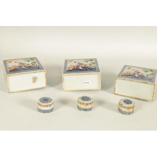 152 - A SET OF THREE 19TH CENTURY CHINESE FAMILLE ROSE PORCELAIN TEA CADDIES of rectangular form with cyli... 