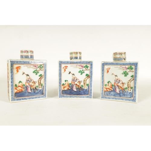 152 - A SET OF THREE 19TH CENTURY CHINESE FAMILLE ROSE PORCELAIN TEA CADDIES of rectangular form with cyli... 