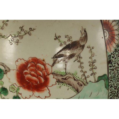 157 - A 19TH CENTURY CHINESE FAMILLE VERTE GINGER JAR ON STAND with panelled floral decoration depicting c... 
