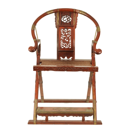 160 - A 19TH CENTURY HUANGHUALI HORSESHOE BACK FOLDING HUNTING CHAIR having curved top rail without scroll... 