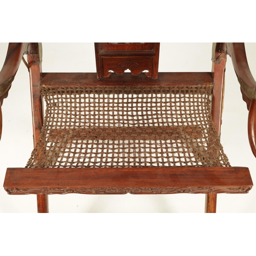 160 - A 19TH CENTURY HUANGHUALI HORSESHOE BACK FOLDING HUNTING CHAIR having curved top rail without scroll... 