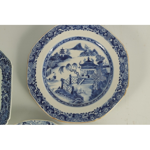 162 - AN 18TH CENTURY CHINESE BLUE AND WHITE CLIPPED RECTANGULAR DISH with fenced garden scene to the cent... 