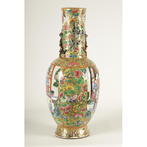 164 - A LARGE 19TH CENTURY CHINESE FAMILLE ROSE PORCELAIN VASE with gilt floral ground enclosing two large... 